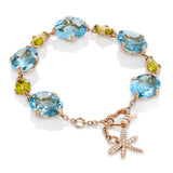 Bracciale Aqua con topazio azzurro e peridoto