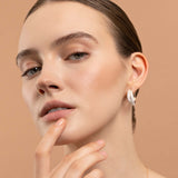 Noblesse Oblige earrings with diamonds