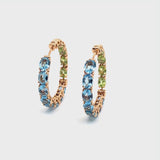 Back to Origin earrings with light blue topaz and peridot