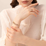 Mikou bangle with black enamel and diamonds