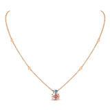 Back to Origin pendant with blue topaz and pink quartz