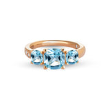 Anello Back to Origin con topazio azzurro e diamanti