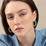 Back to Origin earrings with light blue topaz and peridot