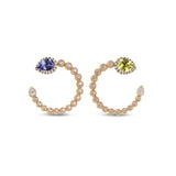 Boutique Paris earrings with diamonds and pear shaped tanzanite peridot