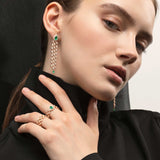 Mikoulette earrings with emeralds and diamonds