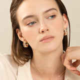 Maureen Medine earrings with diamonds