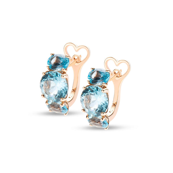 Back to Origin earrings with light blue topaz