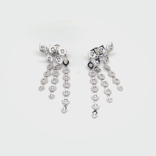 Mikou earrings with three rows of diamonds