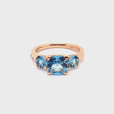Anello Back to Origin con topazio azzurro e diamanti