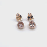 Boutique Paris earrings with diamonds and pear shaped morganite