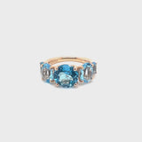 Back to Origin ring with light blue topaz